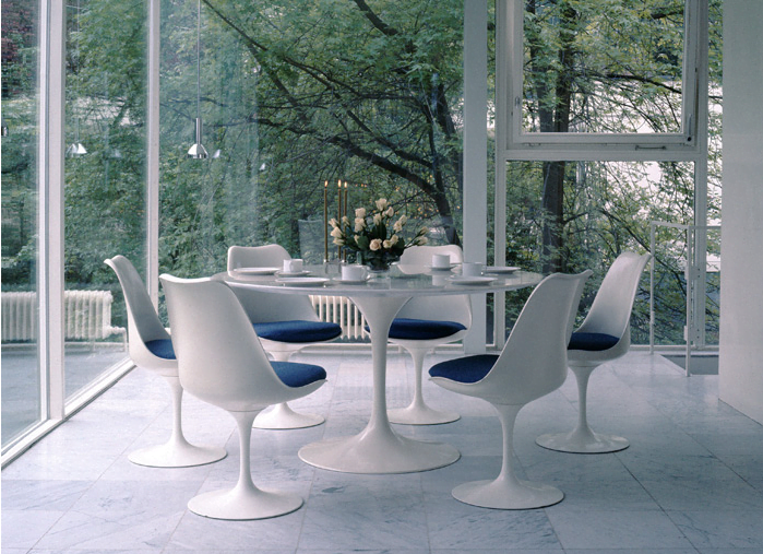 Classic Tulip Chairs and a Saarinen Table, offered by Knoll.